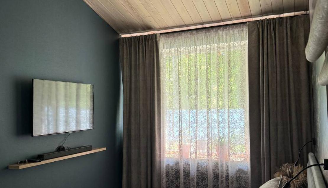 Мастер-спальня в загородном доме в Ахунах